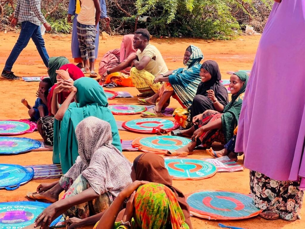 Caregivers and children at a Wa-PYDO early learning session, Dollo Ado refugee camps