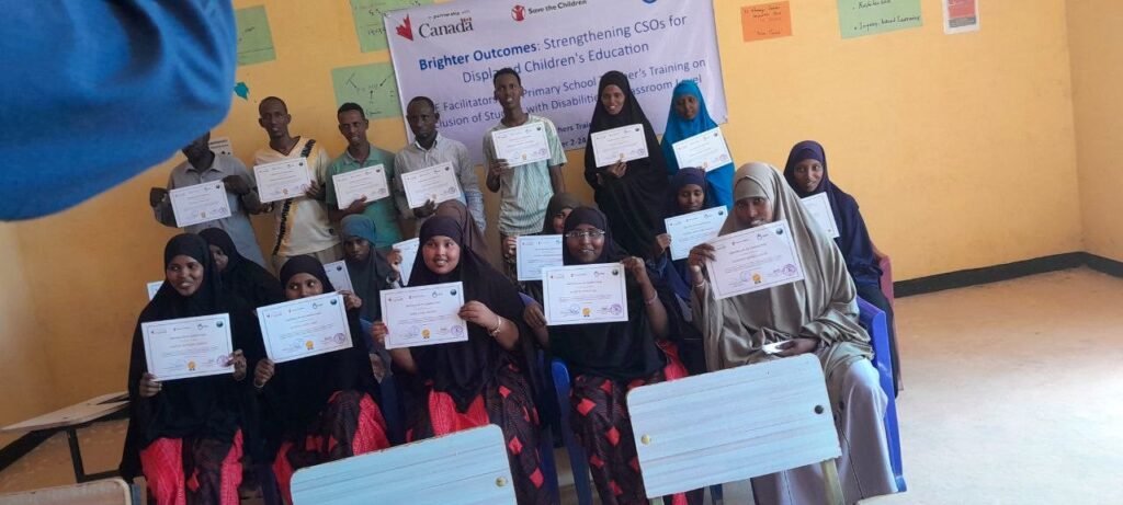 Community members receiving certificates at a Brighter Outcomes Ethiopia training