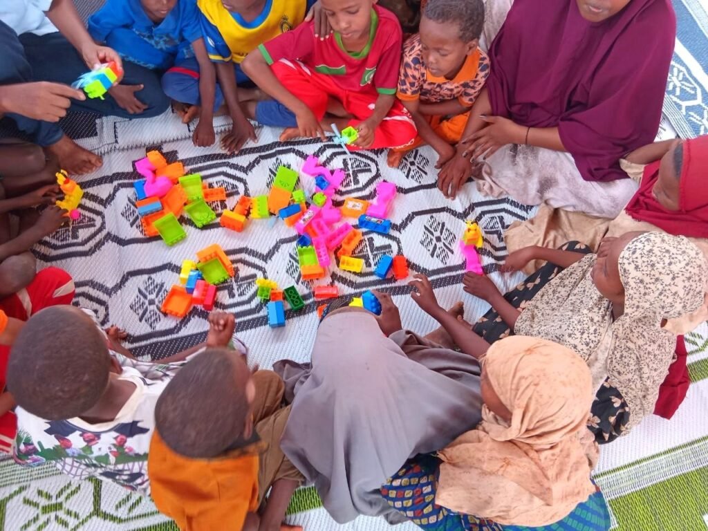 Children using play and learning materials at an ECCE centre, Dollo Ado refugee camps