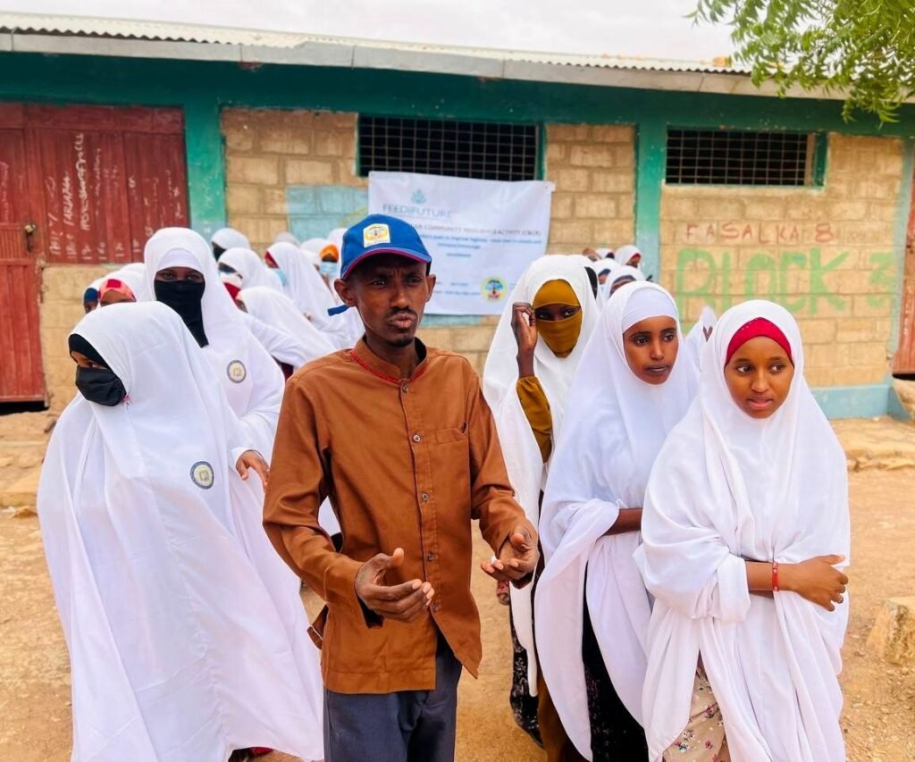 Schoolgirls at a dignity kit distribution, Cross-Border Community Resilience Activity