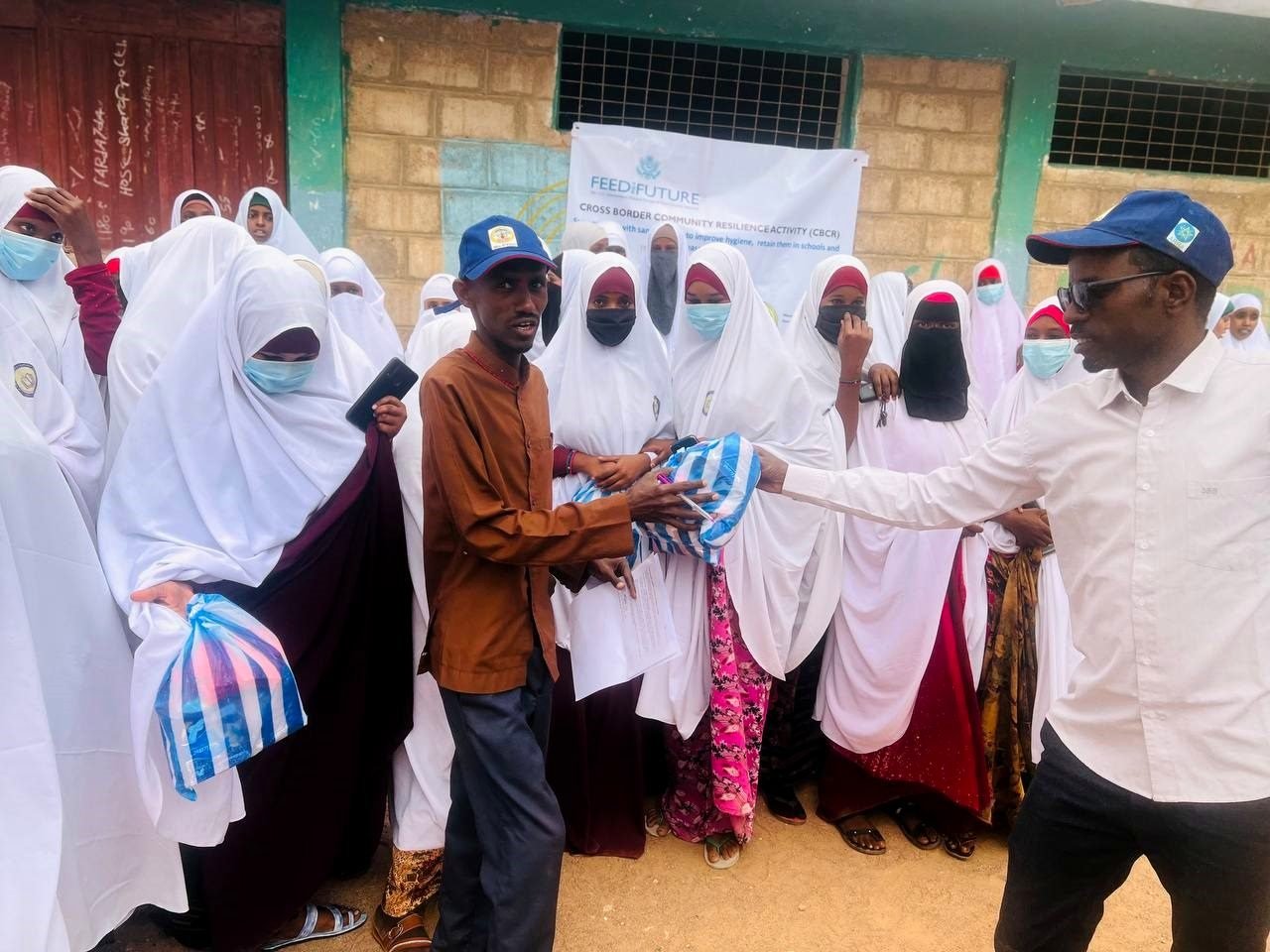 Girls receiving dignity kits at a school in Dollo Ado