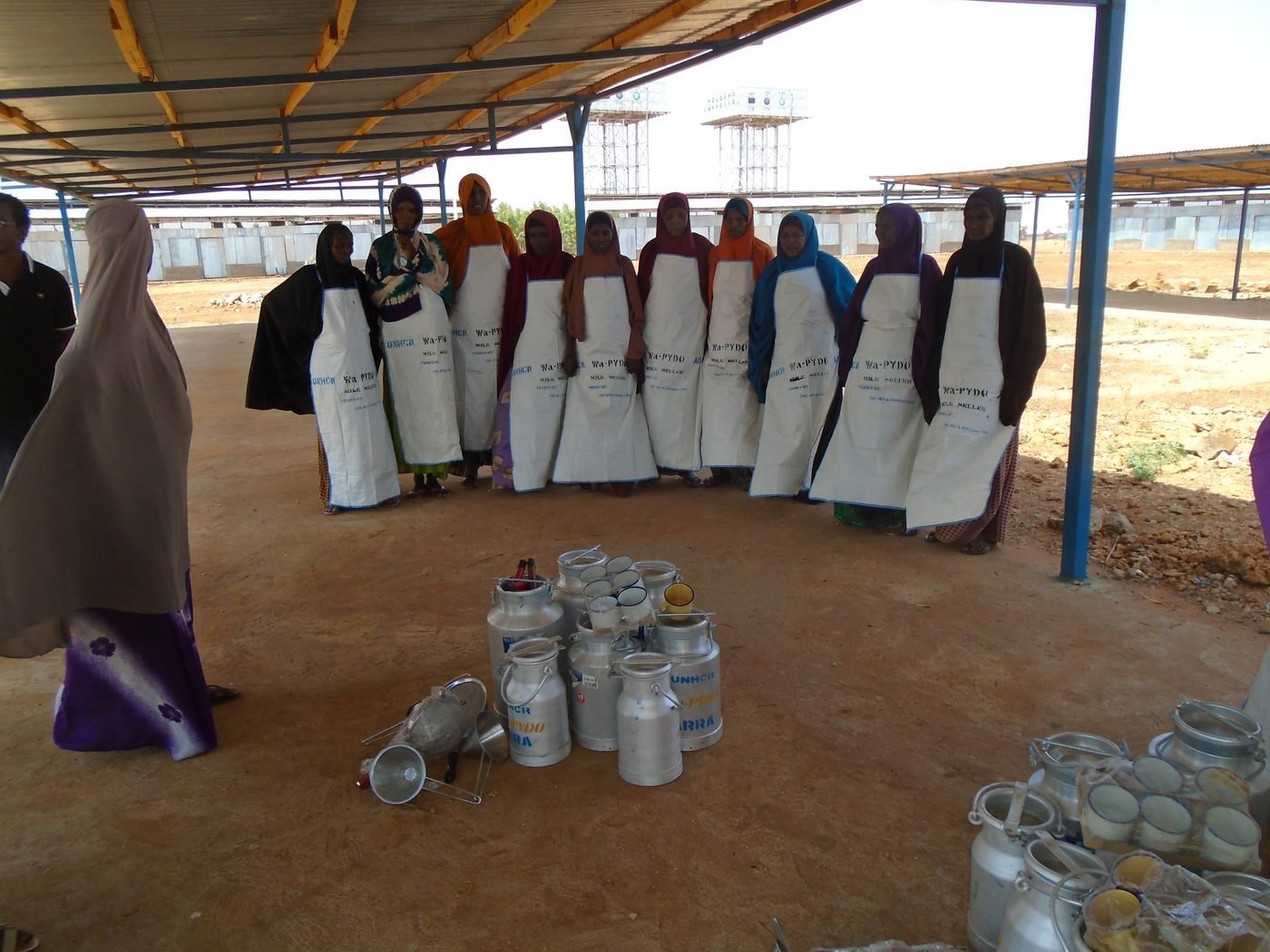 Members of a women milk marketing group with their milk containers, Dollo Ado
